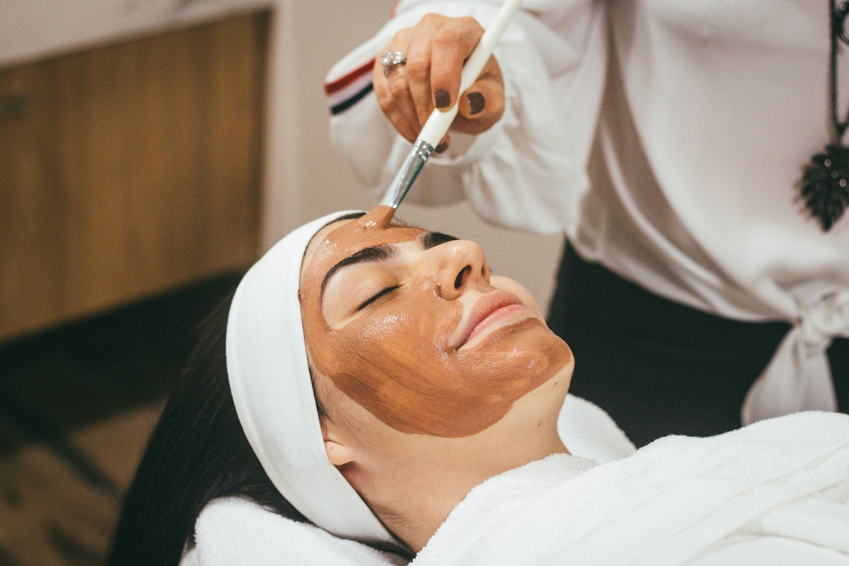 A skincare facial treatment being applied